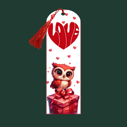 "Aluminum bookmark with red owl on heart gift box, surrounded by hearts, and LOVE text in heart shape at the top, with red tassel."