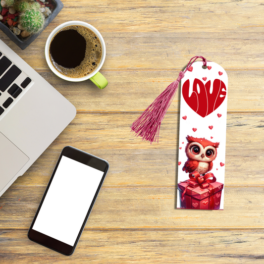 "Aluminum bookmark with red owl on heart gift box, surrounded by hearts, and LOVE text in heart shape at the top, with red tassel."