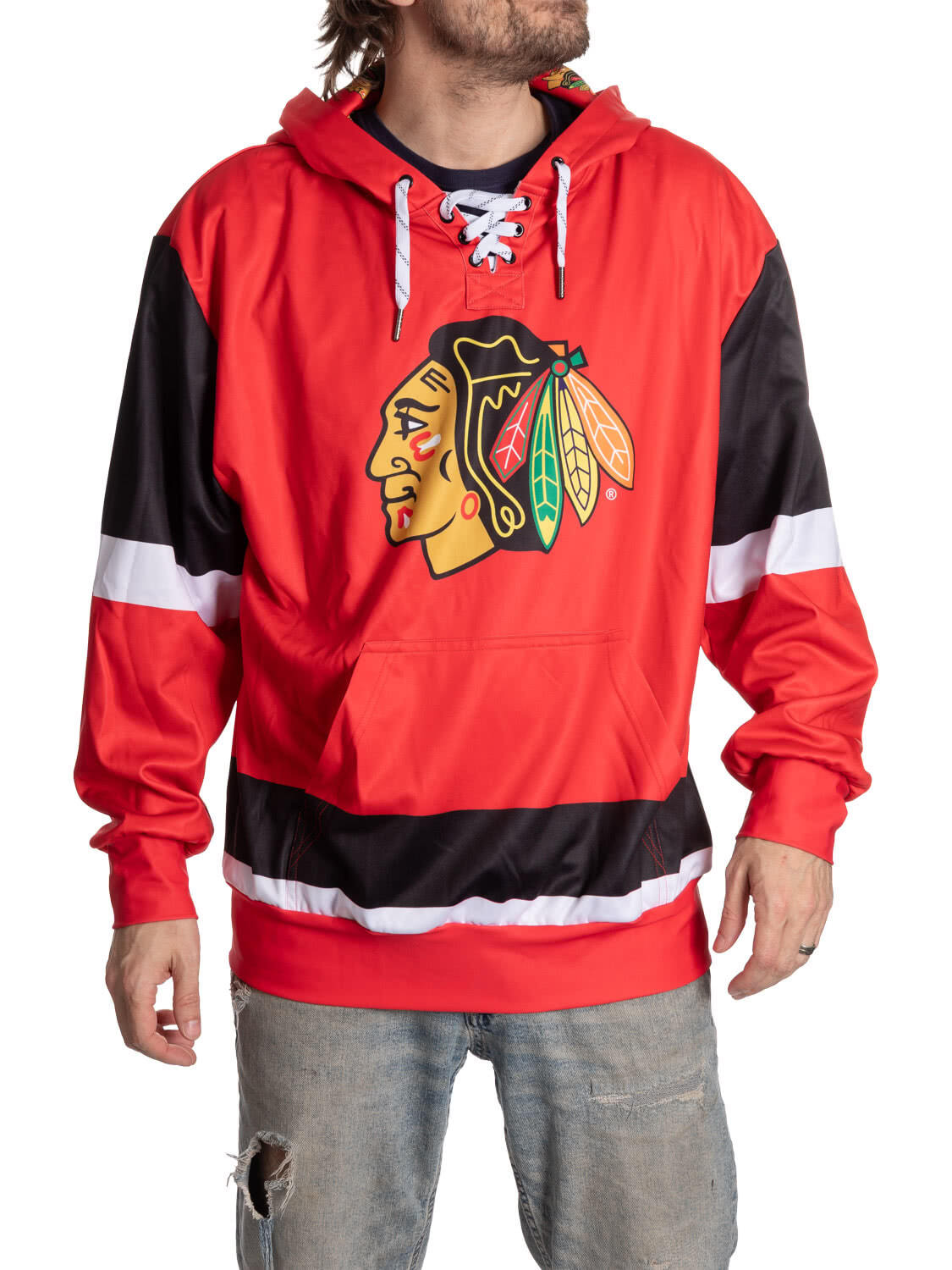 Person wearing a red and black hoodie with a sports team logo on a white background