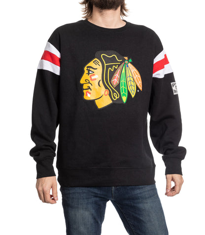 Black sweatshirt with a sports team logo on a white background