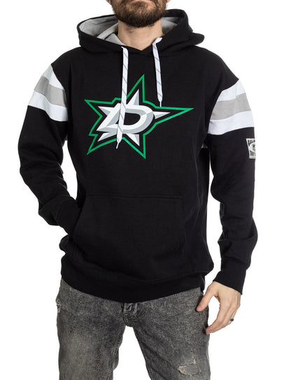 Person wearing a black hoodie with a logo on a white background