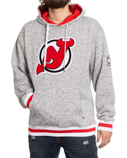 Gray hoodie with red and white accents and a logo on a white background