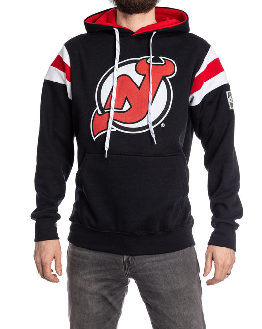Black hoodie with red and white accents featuring a logo on a white background