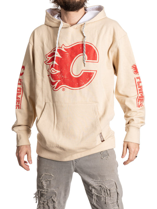 Beige hoodie with red logo and text worn by a person on a white background
