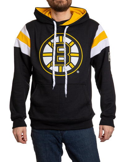 Black hoodie with yellow and white accents featuring a logo, worn by a person on a white background