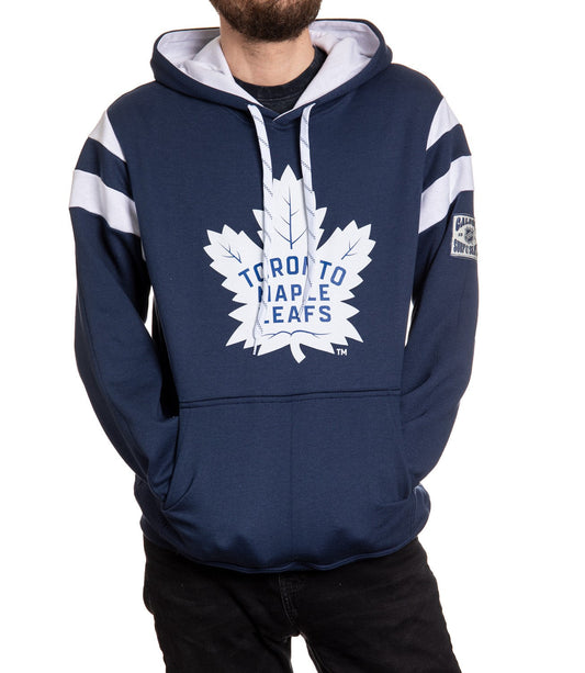 Navy blue hoodie with white maple leaf logo and 'Toronto Maple Leafs' text on a white background