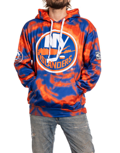 Person wearing a blue and orange tie-dye hoodie with 'New York Islanders' logo on a white background