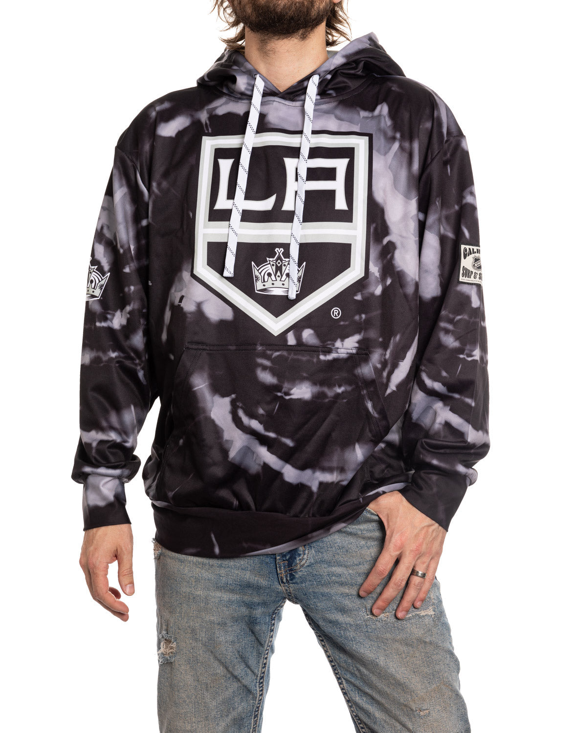 Person wearing a black and gray tie-dye hoodie with a logo on a white background
