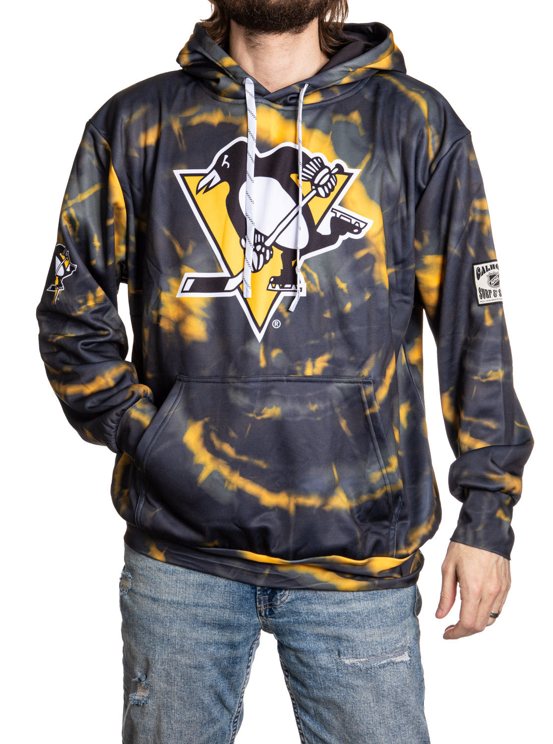 Person wearing a tie-dye hoodie with a logo on a white background