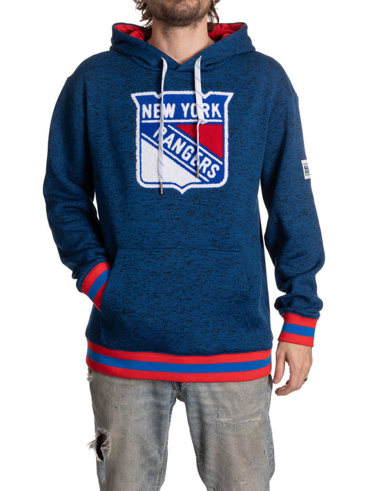 Blue hoodie with New York Rangers logo worn by a person on a white background