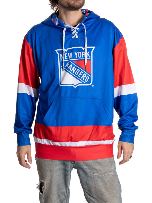 Person wearing a New York Rangers hoodie with blue and red design