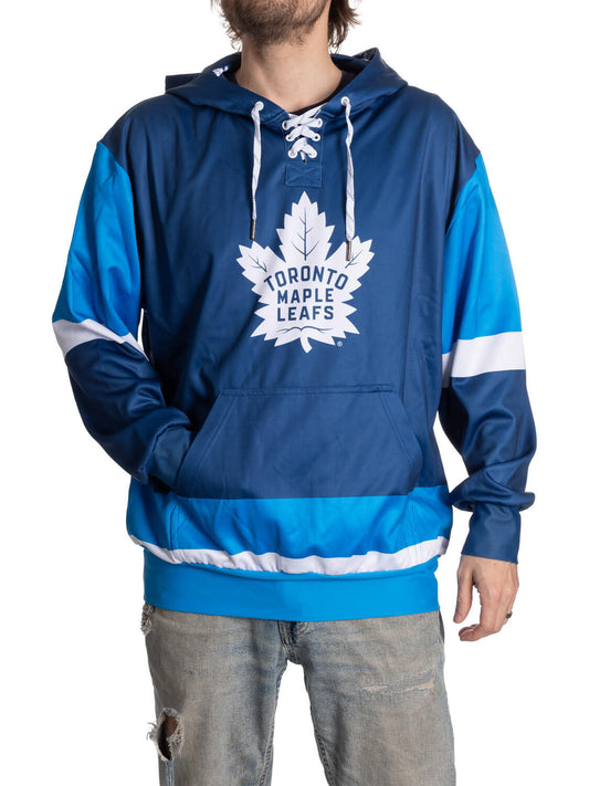 Blue Toronto Maple Leafs hoodie worn by a person on a white background
