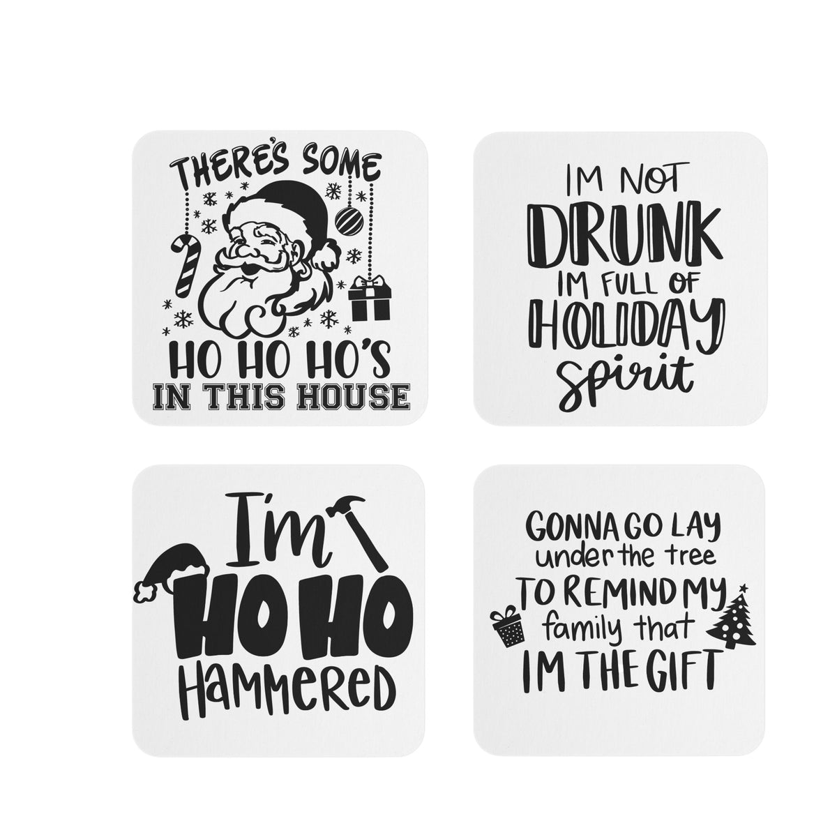 Set of four funny Christmas sublimation coasters featuring humorous holiday sayings: 'There's Some Ho Ho Ho's in This House,' 'I'm Not Drunk, I'm Full of Holiday Spirit,' 'I'm Ho Ho Hammered,' and 'Gonna Go Lay Under the Tree to Remind My Family That I'm the Gift'—perfect for festive decor and gifting